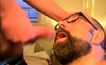 Bearded guy takes two loads to the face from his buddy