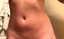 Brunette amateur babe strips off and masturbates
